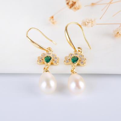 China Fashionable and Beautiful New Listing Fashionable and Beautiful Women's Pearl Ellipse Silver Plated Natural Freshwater Earrings for sale