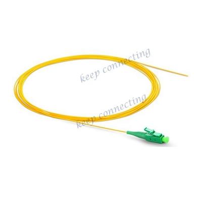 China 0.9mm LC APC Pigtail de fibra óptica para LSZH/PVC Pigtails en equipo FTTH de modo único en venta