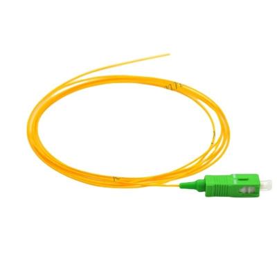 China FTTH G657A/G652D Pigtail de fibra óptica 0,9 mm SC/UPC/APC LSZH/PVC para la hoja de datos central en venta