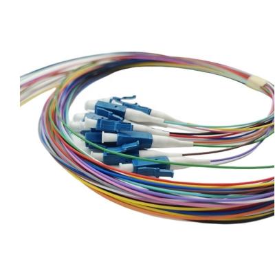 China Tipo de conector LC UPC Pigtail de fibra óptica de colores para equipos FTTH 1M/1.5M 12 núcleos en venta