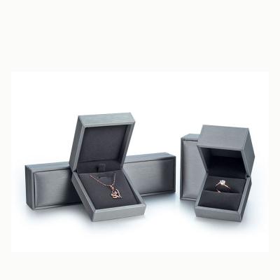 China Jewelry Packaging Hot Sale PU Ring Box Bracelet Necklace Jewelry Packaging Box Dark Gray For Male And Female Diamond for sale