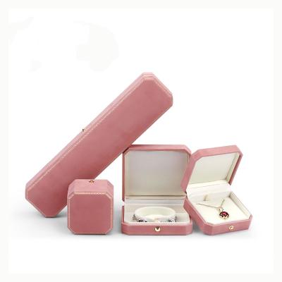 China Jewelry Packaging Pink Octagonal Jewelry Earring Necklace Box White Velvet Insert Ring Bracelet Box With Logo Customized for sale