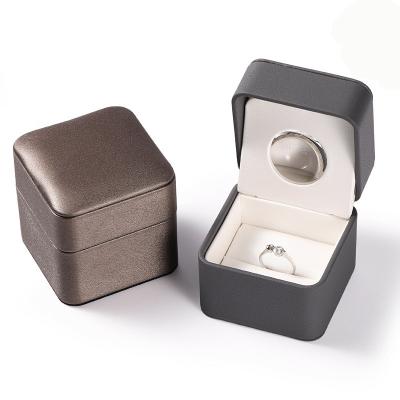 China Unique Jewelry Packaging Surprise Jewelry Package Box Led Light Single Ring Box With Cover for sale