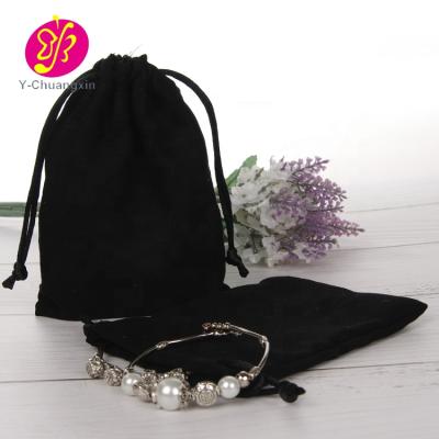 China Recyclable Luxury Black Suede Material Suede Pouch Bag Custom Jewelry Logo for sale