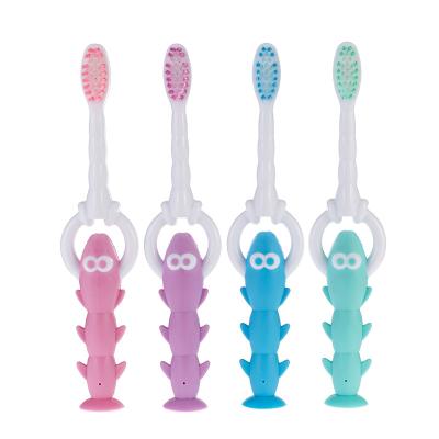 China ISO CE Certified High Quality Environmental Friendly Bottom Suction Cup Bottom Cartoon Handle Kids Toothbrush for sale