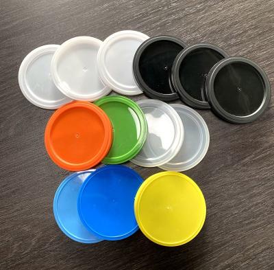 China Orange Plastic Lids For Tin Cans Blue Green Plastic Lids For Canned Dog Food for sale