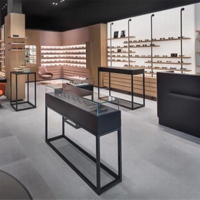 China Customized Modern High Quality Optical Design Store Wood Display Interior Furniture And Glass Showcase for sale