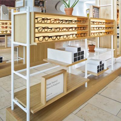 China Modern Wooden Interior Retail Store Layout Ideas Show Kiosk Display Cabinets Kiosk Design For Glasses for sale