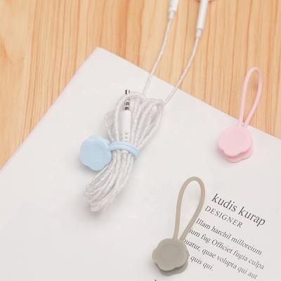 China Magnetic Dust-Repellent Soft Earphone Storage Holder Earphone Cord Winder Magnet Silicone Magnetic Coil Wire Clip Headset Cable Wire Organizer for sale