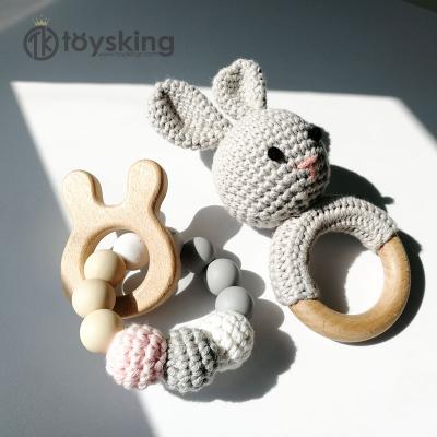 China Infant Nursing Bracelets Baby Gifts Silicone Beads Ring Teething Wood Rattles Wooden Teether Crochet Baby Soft Toy for sale