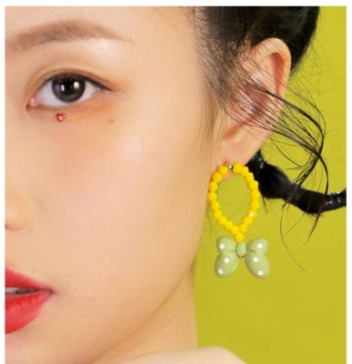 China BOHEMIA Circus Series Original Sweet Cartoon Girl Bow Earrings Super Cute Cute Earrings for sale