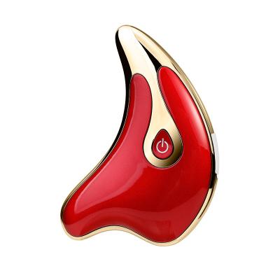 China Unique Vibrating Infrared Anti-Puffiness Ionic Heat Massager 3 in 1 face massage gua sha device mini beauty device 2022 for sale