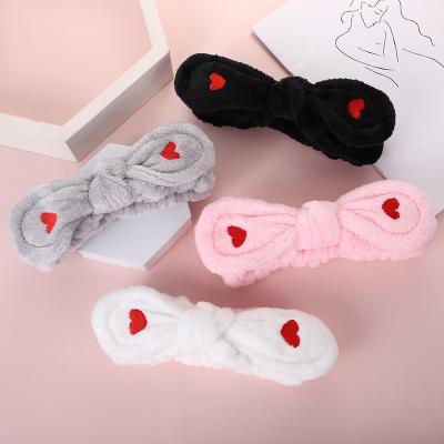 China Wholesale Coral Fleece Women Headband Bowknot Is Peach Heart Face Wash Shower Make Up Girls Spa Headband for sale