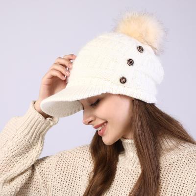 China Fashion Women JOINT Winter Beanie Hat Warm Pompom Knitted Wool Slouchy Hats Peaked Hat With Visor for sale