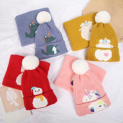 China 2021 New Cute COMMON Cartoon Winter Hat And Neck Warmer For Kids Beanie Cap With Pom Pom Fur Ball For Boys Girls for sale