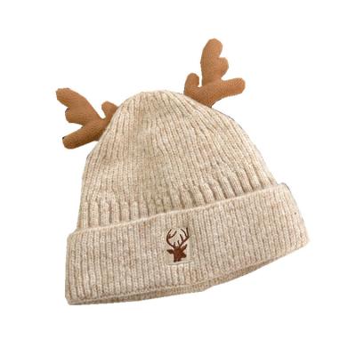 China 2021 Wholesale Cute Antler COMMON Knitted Beanie Cap Plush Inside Winter Hat Christmas Gift For Women for sale