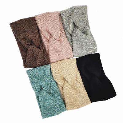 China New popular trending winter knitted headband for women knitting woolen cross headband for sale