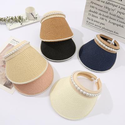 China Hot Selling Character Straw Visor Hat Pearl Headband Paper Sun Visor Covers Empty Top Beach Sun Hat For Women for sale