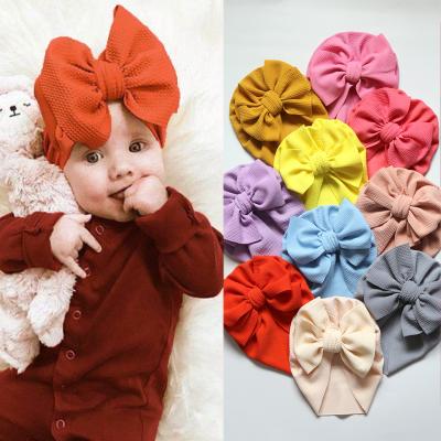 China European and American style hot sale 30 colors baby hair turbans with elastic bow knot baby turban hat for sale