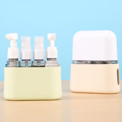 China PERFUME 4 In 1 Spray Bottle Silicone Packaging Suppliers 100Ml Plastic Squeeze Spray Bottles Cosmetics Bottles And Jars Set for sale