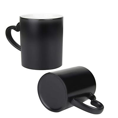 China Viable The Most Popular 11oz Sublimation Mug Ceramic Coffee Mug Color Changing Magic Mug With Heart Shape for sale