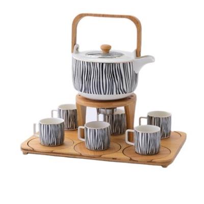 China Factory Sustainable Hot Selling Luxury Modern Teapot 6 Piece Tall Tea Cups Ceramic Porcelain Tea Set Set With Wooden Tray for sale