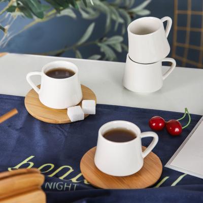 China Factory Sale Unique Hot Viable Style Arabic White Ceramic Cup Modern Milk Tea Set Coffee Cups And Saucers With Bamboo Stand for sale