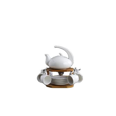 China Sustainable Light Tea Coffee Water Cup With Saucer Ceramic And Bamboo Stand Cup Creativity Tea Set Luxury White for sale