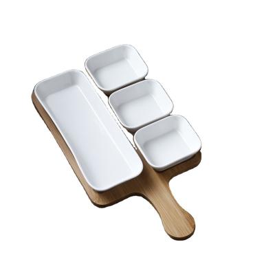 China Sustainable Ceramic Dry Food Fruit Nuts Snack Dish Divided Design Square Shape With Bamboo Handle Dish for sale