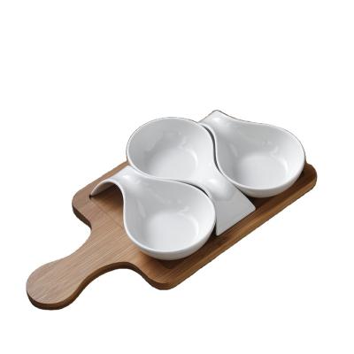 China Sustainable Ceramic Dry Food Fruit Nuts Snack Dish Divided Design One Short With Bamboo Handle Dish for sale