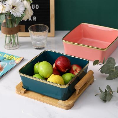 China Sustainable Dinnerware Set Porcelain Fruit Salad Bowl With Bamboo Stand For Restaurant And Home Gathering And Party for sale