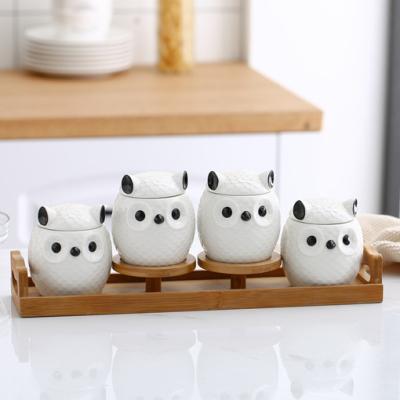 China Conservation Owl Ceramic Seasoning Freshness Set 4 Small Jars With Rack Kitchen Bamboo Ware for sale