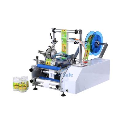 China TS-603 Round Semi Automatic Food Wine Double Side Sticker Digital Bottle Water Labeling Machine For Plastic Bottle for sale