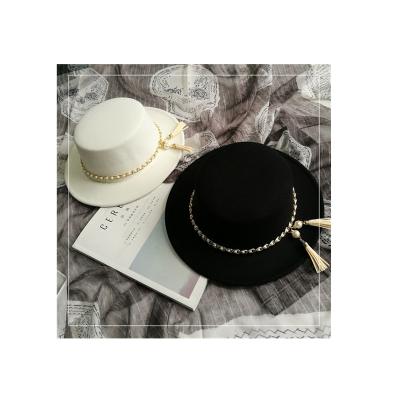 China Wide Brim Wool Felt Fedora Hats Flat Top Elegant Women's Retro Top Hats European And American Chain Pearl Tassel Image for sale