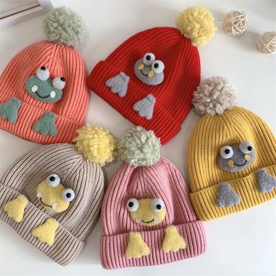 China Picture Knitted Winter Hat Baby Headed Pom Pom Frog Paw Adjustable Elasticity Beanie Winter Cartoon Hats for sale