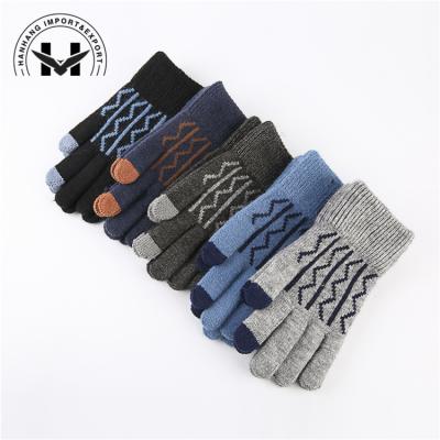 China Hot Sale Knitted Touch Screen Non Slip Full Finger Mitten Winter Touch Screen Snowflake Pattern Acrylic Mittens for sale