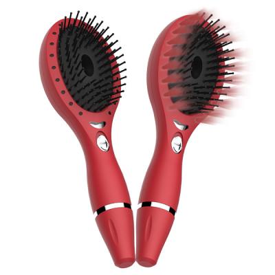 China Battery Operated LED Light Hair Brush Rechargeable Vibrating Hair Therapy Massage Ionic Hair Brush for sale