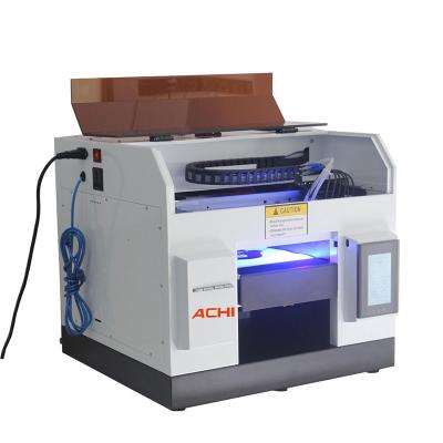 China Hotels Newest A4 Printer UV Flatbed UV Printer For Painting Printing for sale