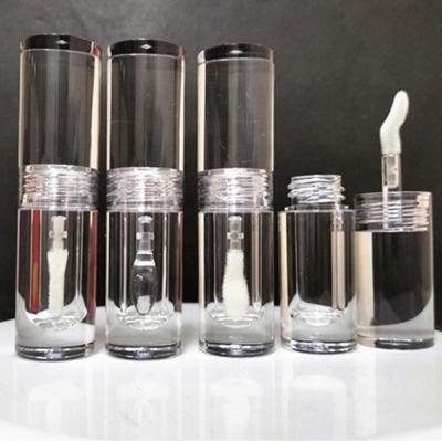 China 2022 New Cosmetic Clear Round Eyeshadow Lip Gloss Empty Tube Crystal Lip Grease Bottle Lip Gloss Containers With Big Thick Brush Applicator 2ml for sale