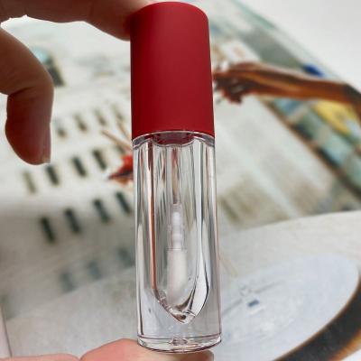 China Moq Cosmetic Round Bottom Empty Lip Gloss Container Soft Touch Lip Gloss Container Clear Red Rubber Tubes Wand With Brush 2.5ml for sale