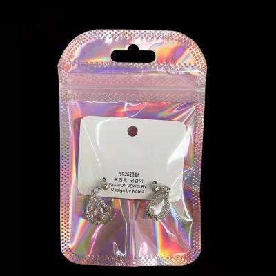 China Gift & Cosmetic Transparent Packaging Craft Bag Pouch Laser Laminated Plastic Packaging For Earrings Accessories Rose Gold Packaging Bags for sale