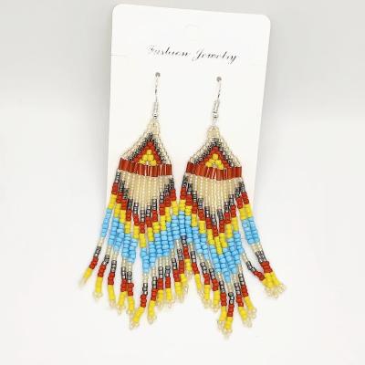 China BOHEMIA S925 Long Fringe Earrings Personality Silver Bohemian Ethnic Style Handwoven Rice Beads Drop Earrings for sale