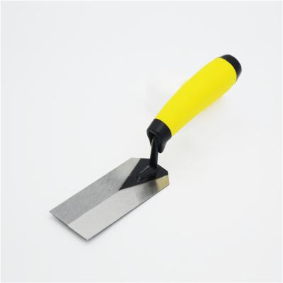 China Carbon Steel Material Blade Cornered Soft Handle Rubber Brick Trowel for sale