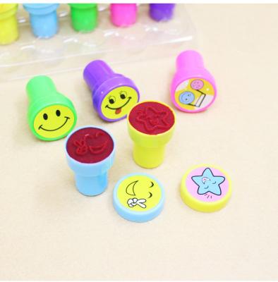 China Children's Toy Seal Kindergarten Children Opening Gift Star Face Stamp Smiling Teacher Comments Small Cute Cartoon Stamp for sale