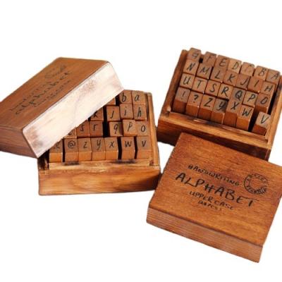 China Self inking stamp Factory price wooden letter self inking stamp 28 for a suit for sale