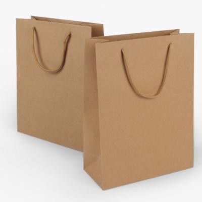 China Recycled Materials Kraft Paper Bag Fashion Shopping Bag Custom Simple Souvenir Bag for sale