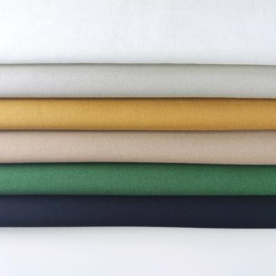 China Wholesale KaiMing QUICK DRY textiles plain dyed 30*68 woven 100% spun viscous rayon fabric, dress shirt fabric for sale