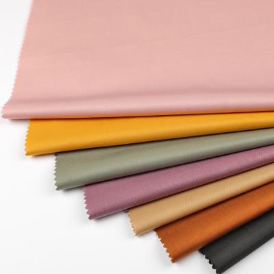 China KaiMing waterproof textiles wholesale 57%Polyester 43%Cotton fabric for dress wind coat garment for sale