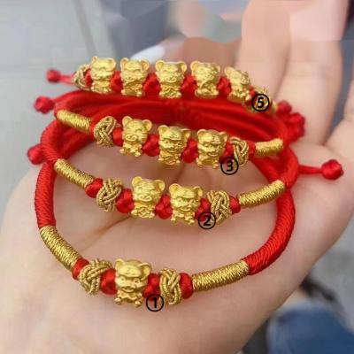 China 3D cute hard five gold tiger lucky gold transfer beads gold zodiac tiger year natal bracelet men and women 999 bracelet for sale