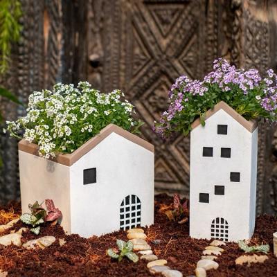 China Rustic Creative Flower Pot Cement Shape Lighthouse Home Outdoor And Indoor Decorative Planter Pots For Plants for sale